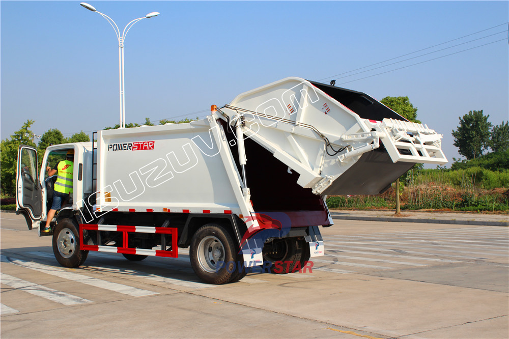 camion compacteur de déchets isuzu