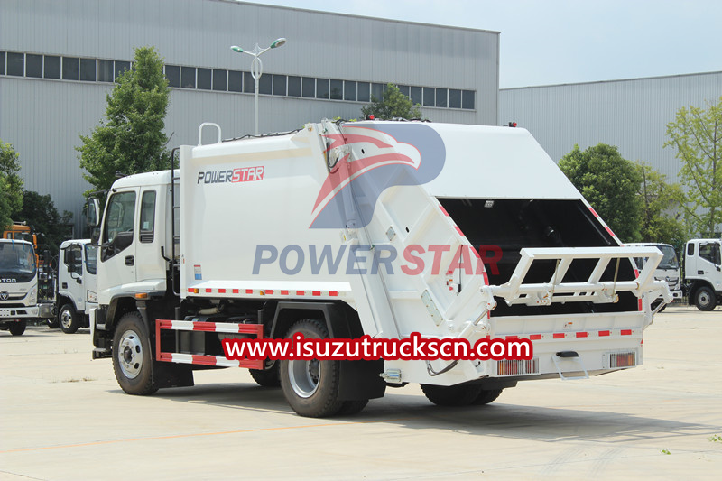 Isuzu FTR republic services rear loader compactor truck