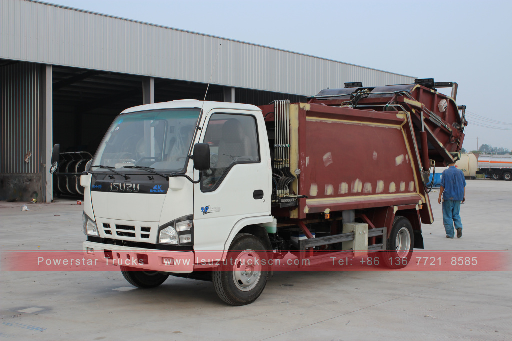 véhicule de compacteur de déchets d'isuzu nkr à vendre