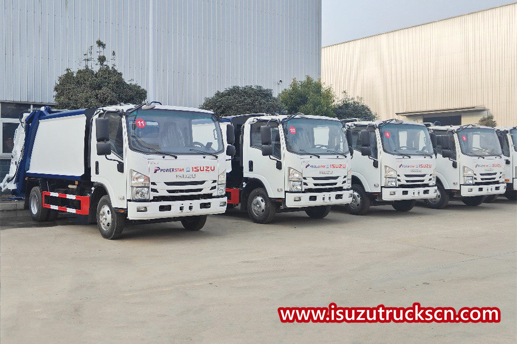 15 unités de camions compacteurs d'ordures Isuzu NKR pour expédition